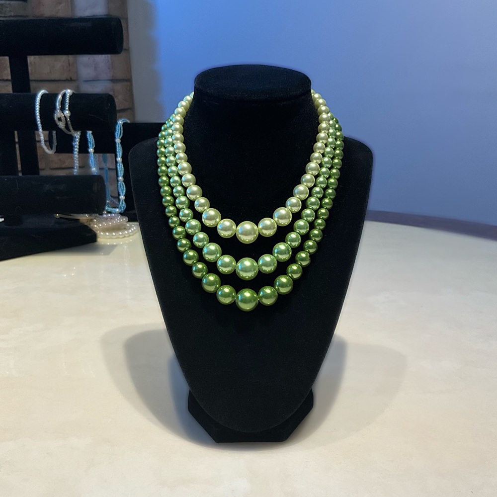 Green faux pearl necklace with silver clasp